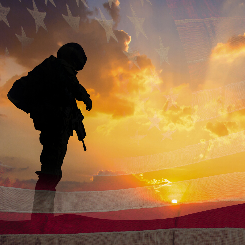 Photo of military person in sunset